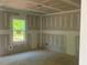 Unfinished bedroom with view of backyard through the window at 6828 Galloway Dr, Middlesex, NC 27557