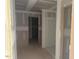 Hallway providing access to various areas, offering a sense of flow and connection at 6828 Galloway Dr, Middlesex, NC 27557