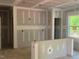 Unfinished living room with natural light coming from the window at 6828 Galloway Dr, Middlesex, NC 27557