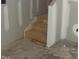 Stairway leading to a basement with unfinished walls and floors at 6828 Galloway Dr, Middlesex, NC 27557