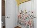 Bathroom showcasing a floral shower curtain at 701 Veterans Dr, Elon, NC 27244