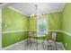 Cozy dining area with chandelier lighting and a charming table set for intimate gatherings at 701 Veterans Dr, Elon, NC 27244