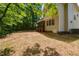 Expansive backyard with a mix of open space and trees offers versatile outdoor living at 716 Lakeview Ave, Wake Forest, NC 27587