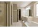 Bright bathroom with double vanity, soaking tub, and walk-in shower at 716 Lakeview Ave, Wake Forest, NC 27587