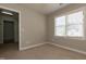 Bedroom with carpet flooring and natural light at 716 Lakeview Ave, Wake Forest, NC 27587
