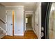 Bright foyer with hardwood floors and neutral paint, offering a welcoming entrance at 716 Lakeview Ave, Wake Forest, NC 27587