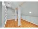 Walk-in closet featuring custom shelving and hardwood floors at 823 Churchill Dr, Chapel Hill, NC 27517