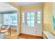 Entrance hall featuring hardwood floors with views into the front yard at 823 Churchill Dr, Chapel Hill, NC 27517