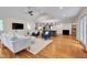 Bright open-concept living space with hardwood floors and modern furnishings and finishes at 823 Churchill Dr, Chapel Hill, NC 27517
