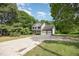 Spacious two-story home with an attached garage and a well-maintained lawn at 84 Sycamore Lake Rd, Siler City, NC 27344