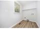 The laundry room is simple with shelving at 84 Sycamore Lake Rd, Siler City, NC 27344