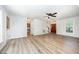 Bright, open-concept living room with wood floors and plenty of natural light at 84 Sycamore Lake Rd, Siler City, NC 27344
