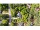 Charming home with solar panels nestled amidst lush greenery and a well-maintained yard at 909 Alderleaf Dr, Fuquay Varina, NC 27526