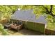 Aerial shot shows backyard deck and green siding at 909 Alderleaf Dr, Fuquay Varina, NC 27526