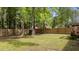 The backyard features a fenced-in yard, offering a private outdoor space at 909 Alderleaf Dr, Fuquay Varina, NC 27526