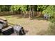 Large, fenced backyard with mature trees providing ample shade and privacy at 909 Alderleaf Dr, Fuquay Varina, NC 27526