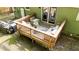 Outdoor wooden deck with patio furniture and green surroundings at 909 Alderleaf Dr, Fuquay Varina, NC 27526