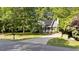 This home features a driveway with solar panels on the roof, offering sustainable energy solutions at 909 Alderleaf Dr, Fuquay Varina, NC 27526