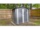 A metal shed offers additional outdoor storage with a practical and durable design at 909 Alderleaf Dr, Fuquay Varina, NC 27526