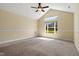 Spacious bedroom with large windows and carpeted floors at 924 Carolina Bell Rd, Apex, NC 27502