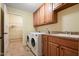 Laundry room with washer, dryer, and utility sink at 924 Carolina Bell Rd, Apex, NC 27502