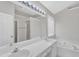 Well-lit bathroom with a double vanity, large mirror, and separate shower and tub at 10 Marsh Landing Ct, Durham, NC 27703