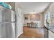 A bright dining area featuring wood floors and lots of light at 10 Marsh Landing Ct, Durham, NC 27703