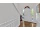 Bright entryway featuring fresh white walls and a wood floor at 10 Marsh Landing Ct, Durham, NC 27703
