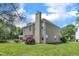 Exterior of home with large yard and trees at 10 Marsh Landing Ct, Durham, NC 27703