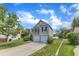 Charming two-story home with a two car garage, manicured lawn, and view of the lake at 10 Marsh Landing Ct, Durham, NC 27703