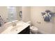 Cozy bathroom featuring a vanity with dark cabinetry and coordinated towel decorations at 1033 Talisker Way # 16, Burlington, NC 27215