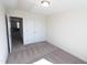 Inviting bedroom showcasing neutral walls, carpet, and closet for a peaceful retreat at 1033 Talisker Way # 16, Burlington, NC 27215