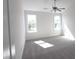 Light-filled bedroom with a ceiling fan and natural light flooding in from windows at 1033 Talisker Way # 16, Burlington, NC 27215