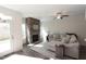 Inviting living room with a stone fireplace, plush seating, and a walk-out to the yard at 1033 Talisker Way # 16, Burlington, NC 27215