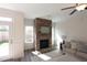 Inviting living room with a stone fireplace, plush seating, and a walk-out to the yard at 1033 Talisker Way # 16, Burlington, NC 27215