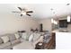 Open-concept living space with a dining area, fireplace, and views of the kitchen and backyard at 1033 Talisker Way # 16, Burlington, NC 27215