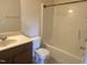 Bathroom with shower-tub combination, vanity, and toilet at 104 Elmsford St, Durham, NC 27703