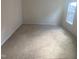 Bedroom with neutral carpet and natural light from a single window at 104 Elmsford St, Durham, NC 27703