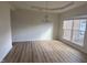 Dining room with modern chandelier and large window at 104 Elmsford St, Durham, NC 27703