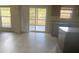 Open kitchen area with sliding glass door access to patio and backyard at 104 Elmsford St, Durham, NC 27703