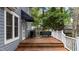Outdoor deck with white railings, a black awning, and a gray grill at 1100 Cardinals Knob, Rocky Mount, NC 27804