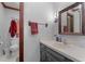 Bathroom featuring a white sink and counter, gray cabinets, and bronze fixtures at 1100 Cardinals Knob, Rocky Mount, NC 27804