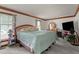 Spacious bedroom features a bed with a light blue comforter and decorative pillows at 1100 Cardinals Knob, Rocky Mount, NC 27804