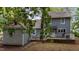 Home exterior with light blue siding, white trim, and a small wood porch at 1100 Cardinals Knob, Rocky Mount, NC 27804