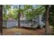 This home features light blue siding, white trim, and a small wood porch at 1100 Cardinals Knob, Rocky Mount, NC 27804