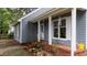 Charming home showcasing front porch, landscaping and brick pavers at 1100 Cardinals Knob, Rocky Mount, NC 27804