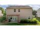 Backyard featuring a wood pergola, an outdoor cooking area, and green grass at 1301 Torrey Pines Ct, Mebane, NC 27302
