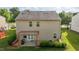 Backyard featuring a wood pergola, an outdoor cooking area, and green grass at 1301 Torrey Pines Ct, Mebane, NC 27302