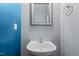 Powder room with blue accent wall and vessel sink at 1301 Torrey Pines Ct, Mebane, NC 27302