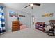 Charming Bedroom with a rocking chair, dresser, and changing table, perfect for a baby at 1301 Torrey Pines Ct, Mebane, NC 27302